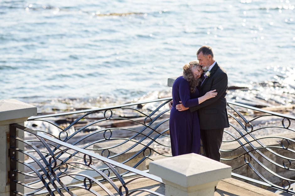 couple snuggling at ross bay beach