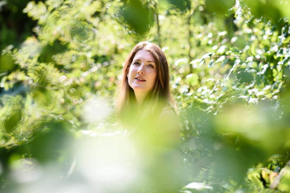 apple tree framing girl's face