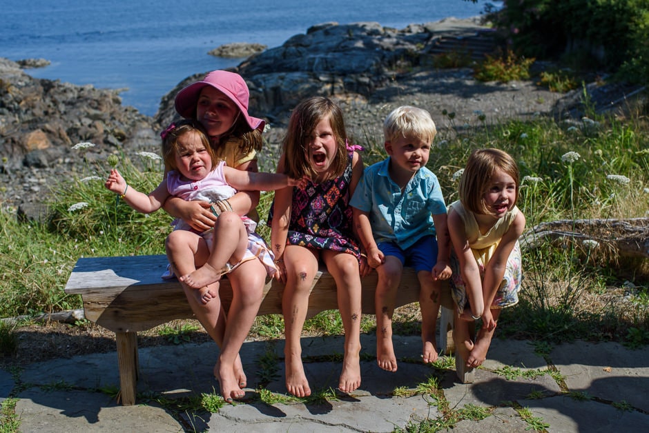 kids failing to pose for group portrait