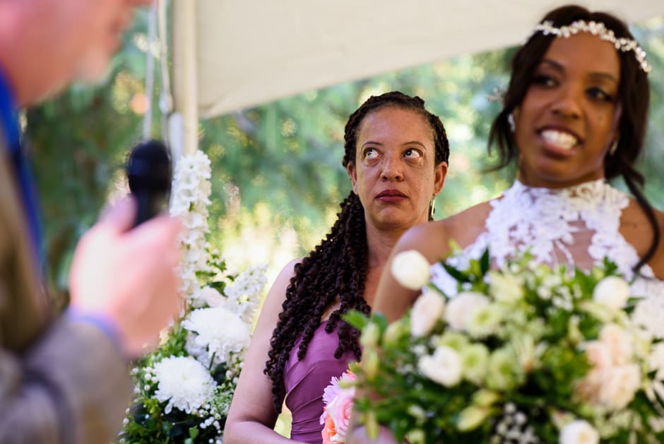 bridesmaid getting emotional during ceremony