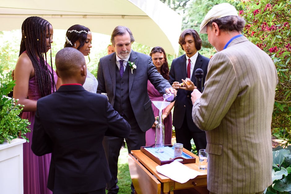 sand ceremony with couple and their children