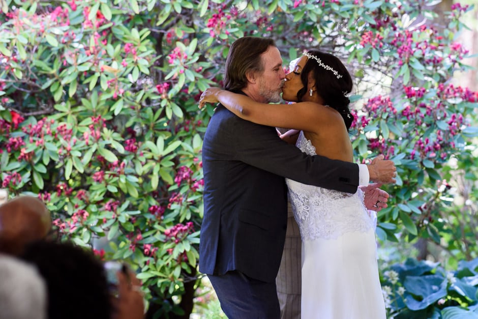 first kiss during backyard wedding ceremony in Courtenay BC