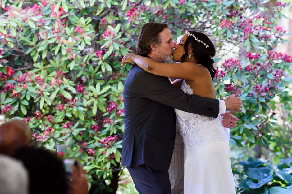 first kiss during backyard wedding ceremony in Courtenay BC